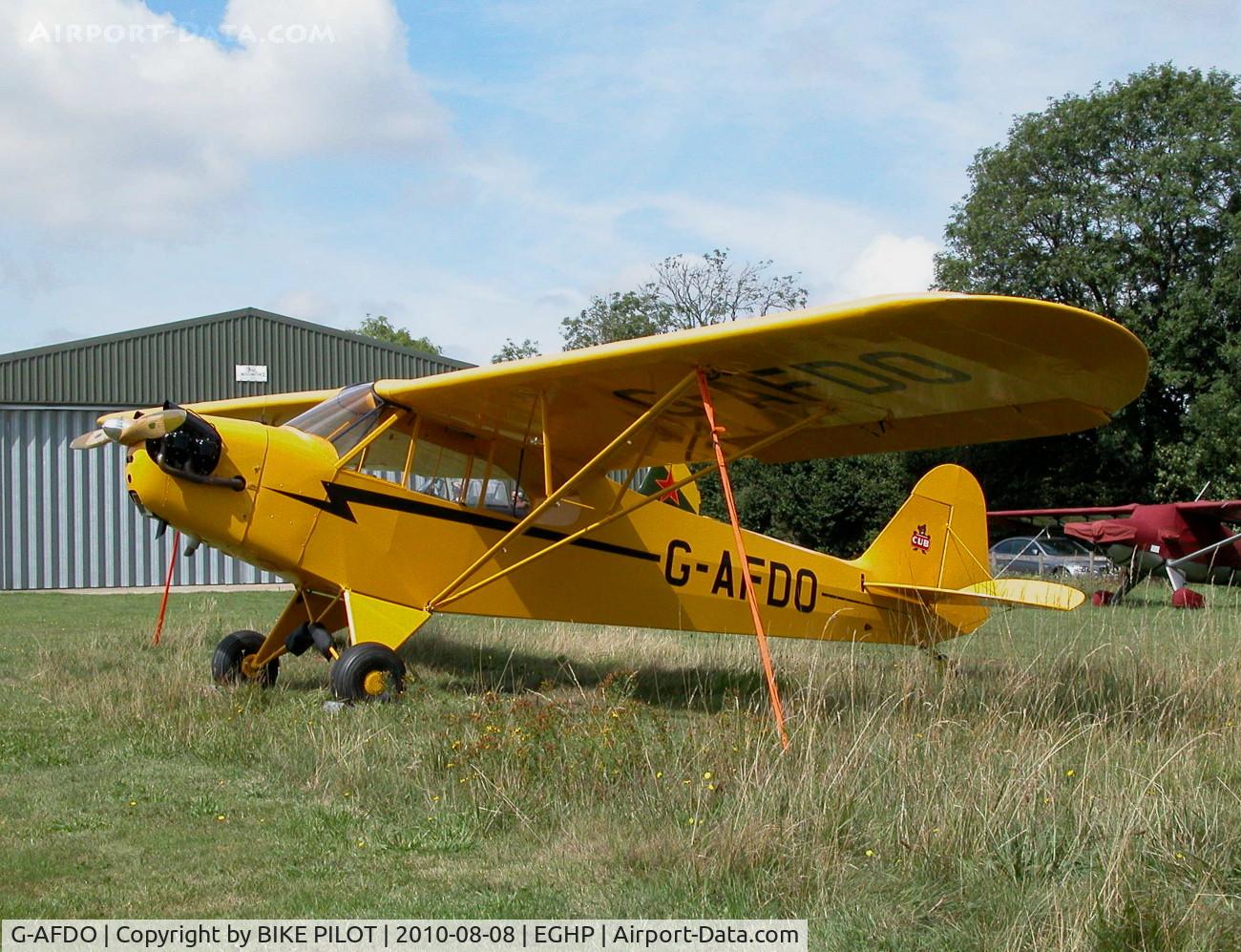 G-AFDO, 1938 Piper J3C-65 Cub Cub C/N 2593, POSSIBLE NEW RESIDENT. POPHAM AUSTER FLY-IN 2010-08-08.