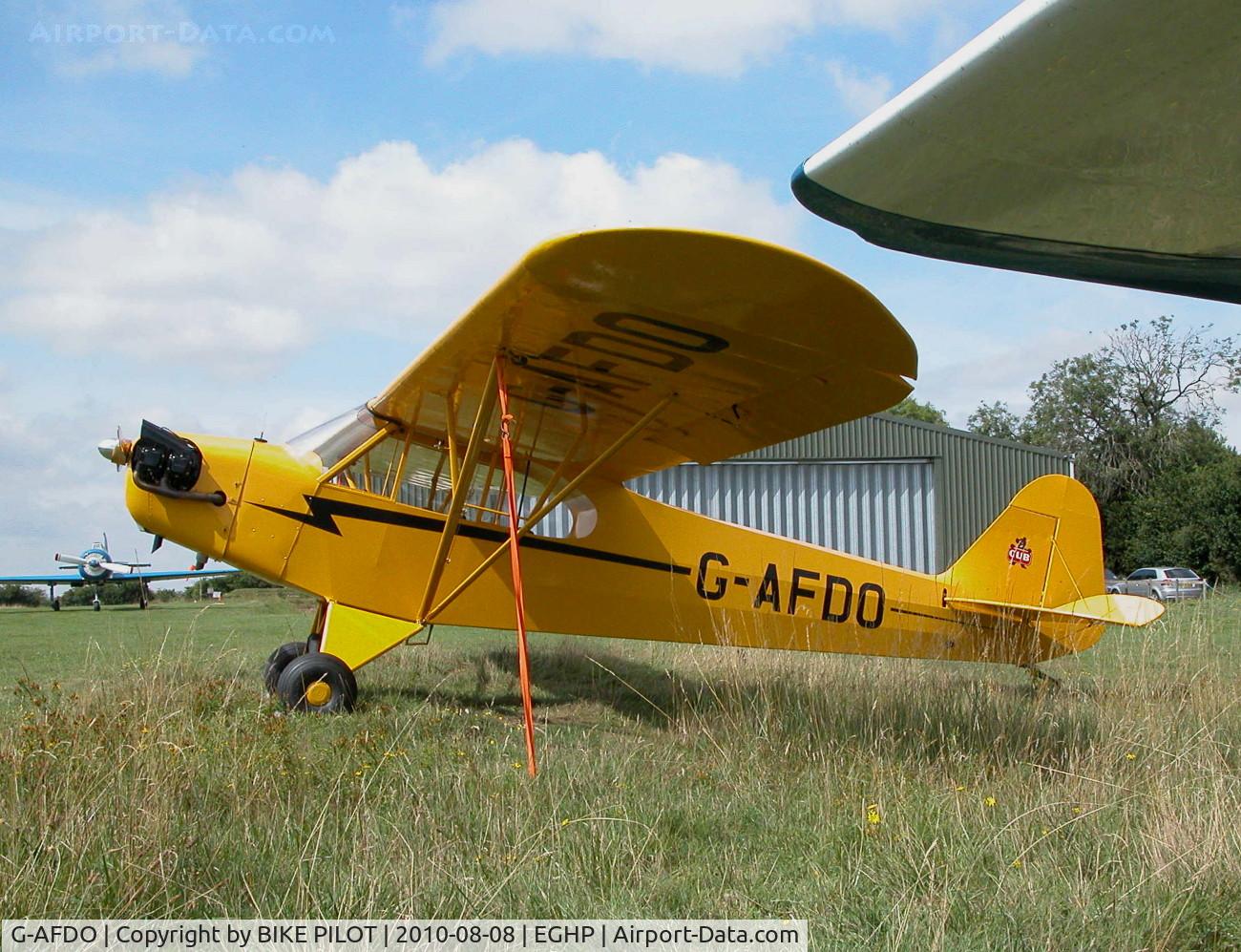 G-AFDO, 1938 Piper J3C-65 Cub Cub C/N 2593, POSSIBLE NEW RESIDENT. POPHAM AUSTER FLY-IN 2010-08-08.