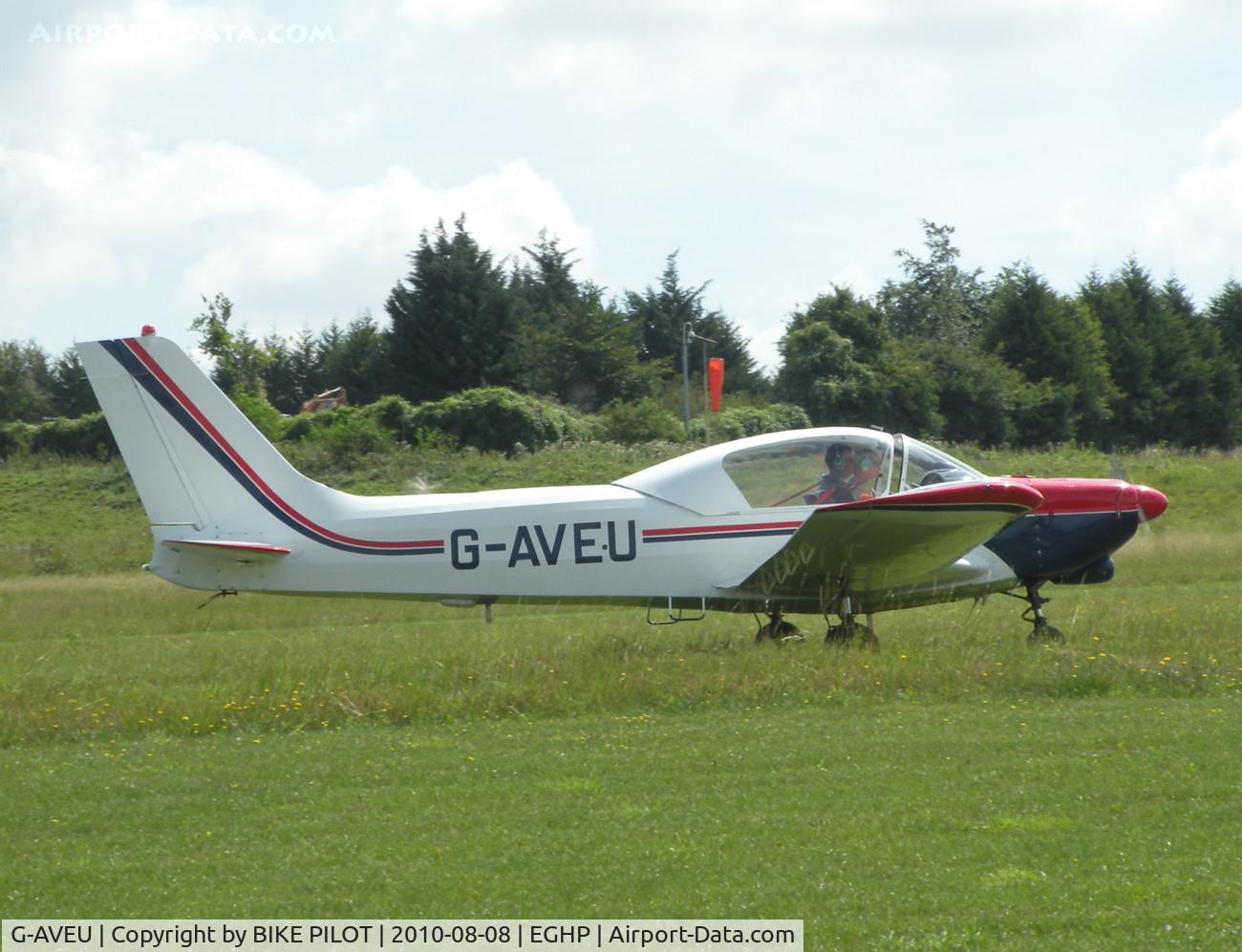 G-AVEU, 1967 Wassmer WA-41 Baladou C/N 136, ECHO UNIFORM TAXYING IN AND LOOKING RATHER LIKE AN SF.260. POPHAM AUSTER FLY-IN 2010-08-08.