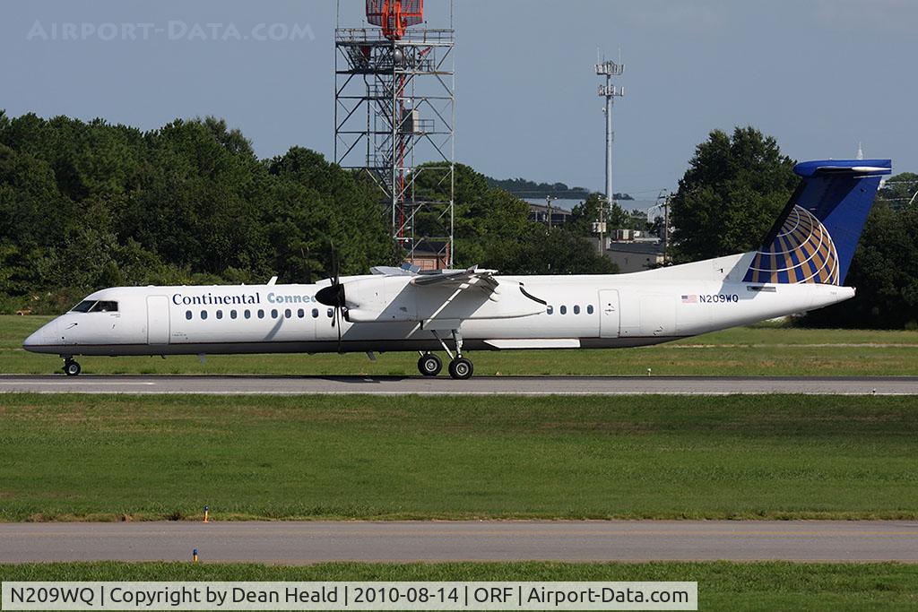 N209WQ, 2008 De Havilland Canada DHC-8-402Q Dash 8 Dash 8 C/N 4209, Continental Connection (Colgan Air) N209WQ (FLT CJC3325) rolling out on RWY 5 after arrival from Newark Liberty Int'l (KEWR).