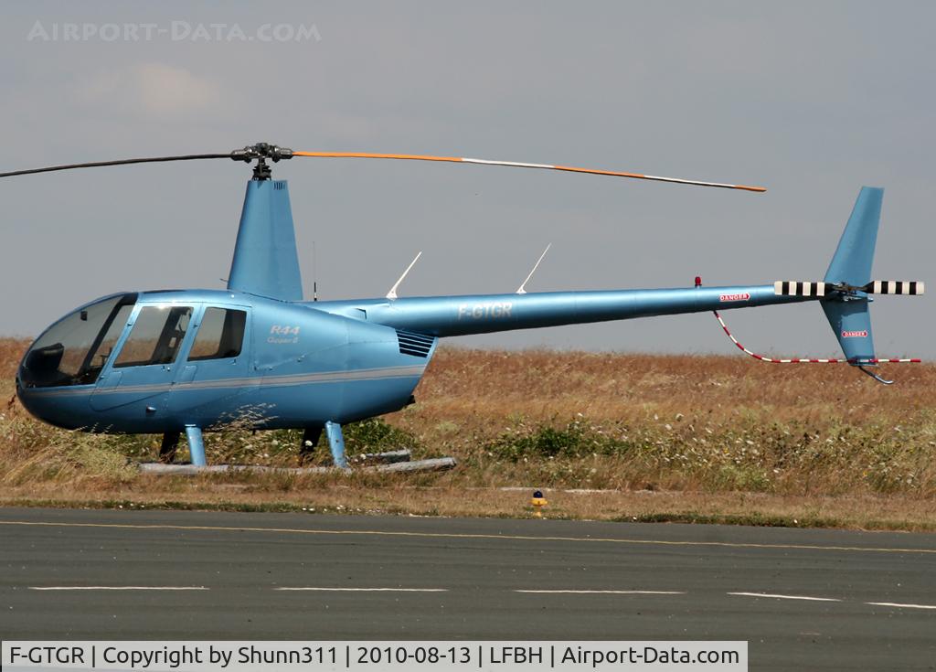 F-GTGR, 2004 Robinson R44 Raven II C/N 10499, Parked in the grass...