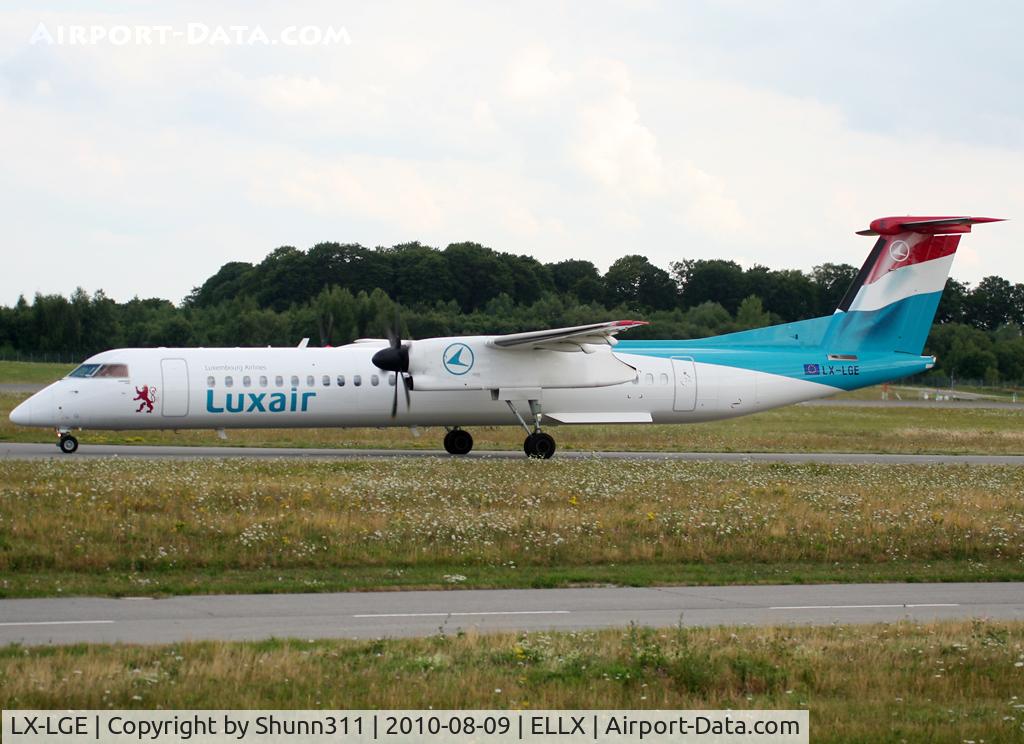 LX-LGE, 2009 De Havilland Canada DHC-8-402Q Dash 8 C/N 4284, Taxiing holding point rwy 24 for departure...