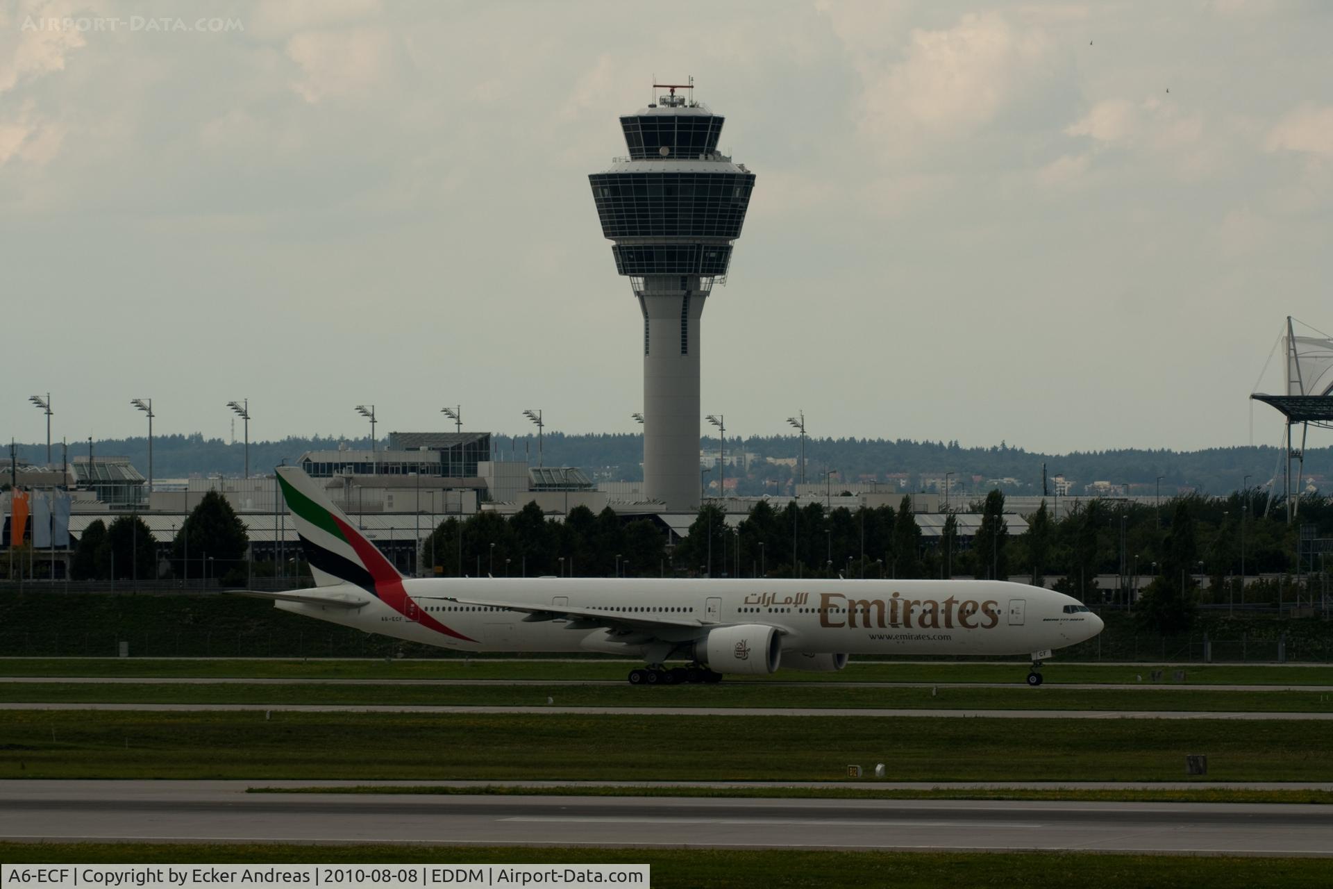 A6-ECF, 2007 Boeing 777-36H/ER C/N 35574, A Emirates B777-31H in front of the Munich Tower