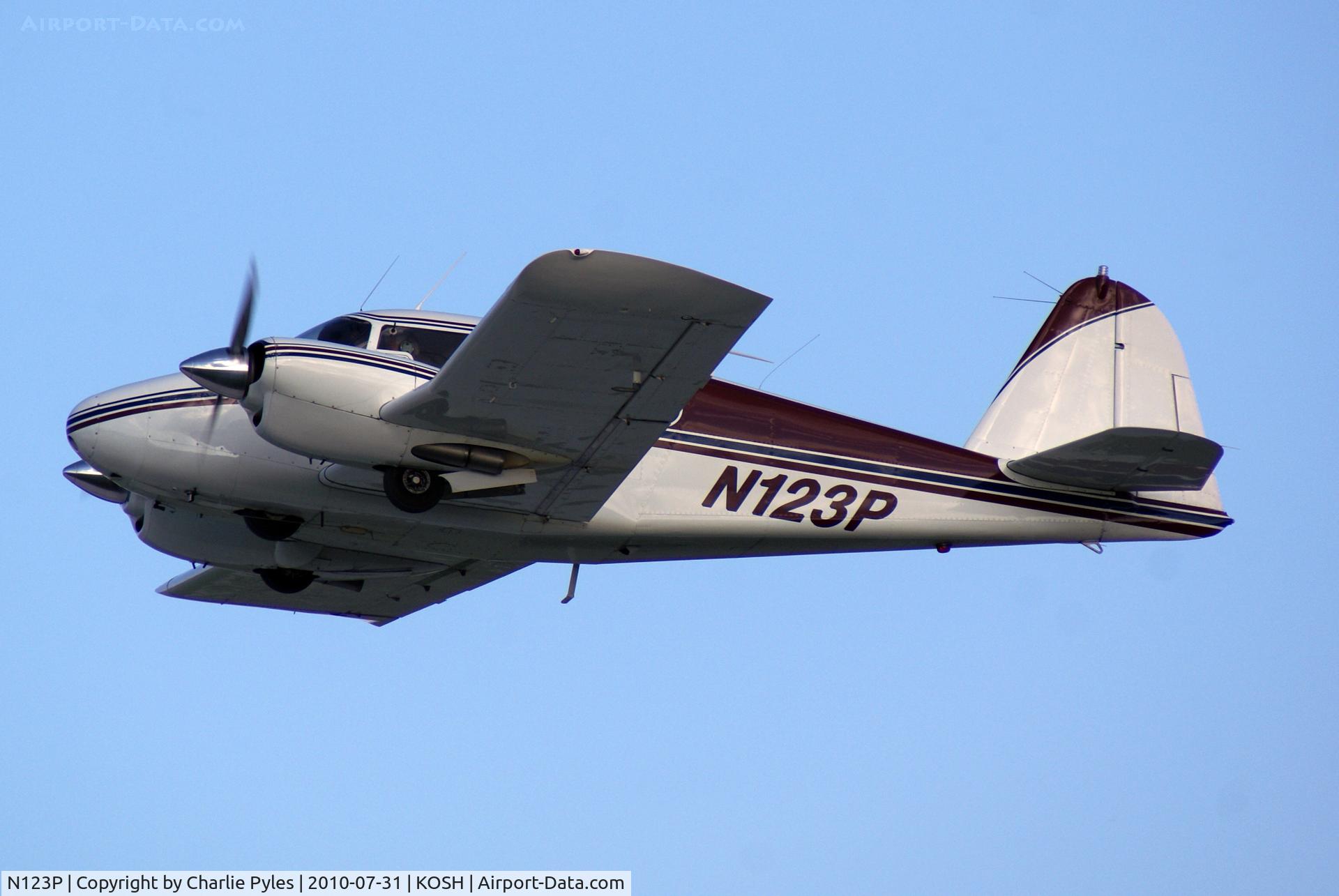 N123P, 1955 Piper PA-23-250 Aztec C/N 23-397, 1955 Piper PA-23 Apache leaving AirVenture 2010.