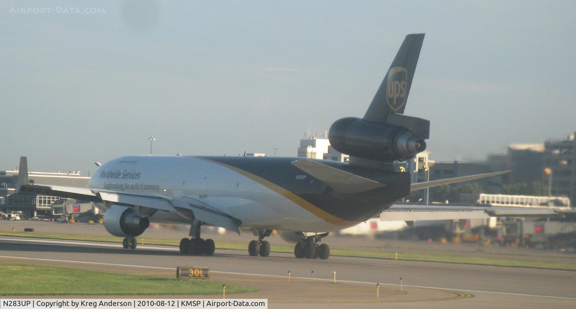 N283UP, 1991 McDonnell Douglas MD-11F C/N 48484, Poor photo of a UPS MD-11 on departure roll from MSP.