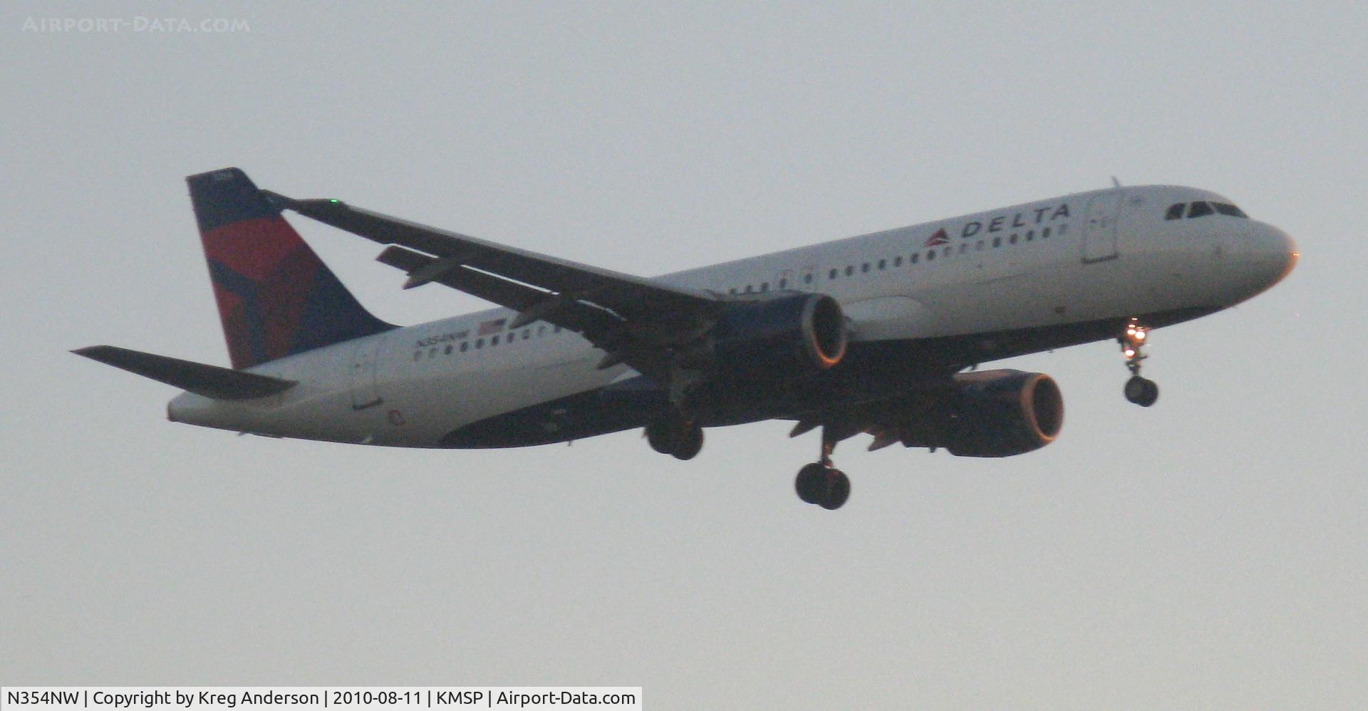 N354NW, 1998 Airbus A320-212 C/N 801, Poor photo of a Delta Airlines Airbus A320-212 landing at MSP.