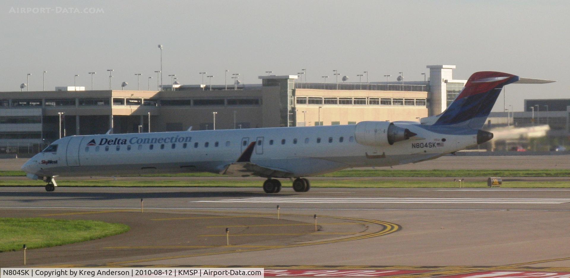 N804SK, 2006 Bombardier CRJ-900ER (CL-600-2D24) C/N 15067, Delta Connection CRJ beginning its takeoff roll at MSP.