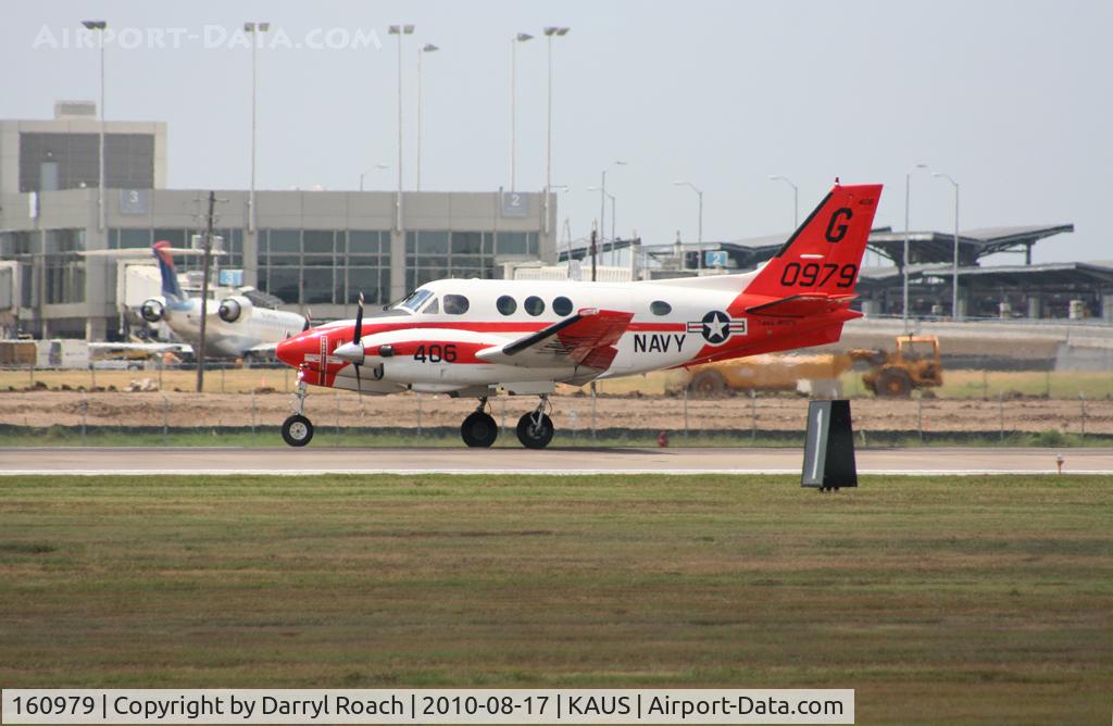 160979, Beechcraft T-44A Pegasus C/N LL-31, Navy Beechcraft touches down 17L.