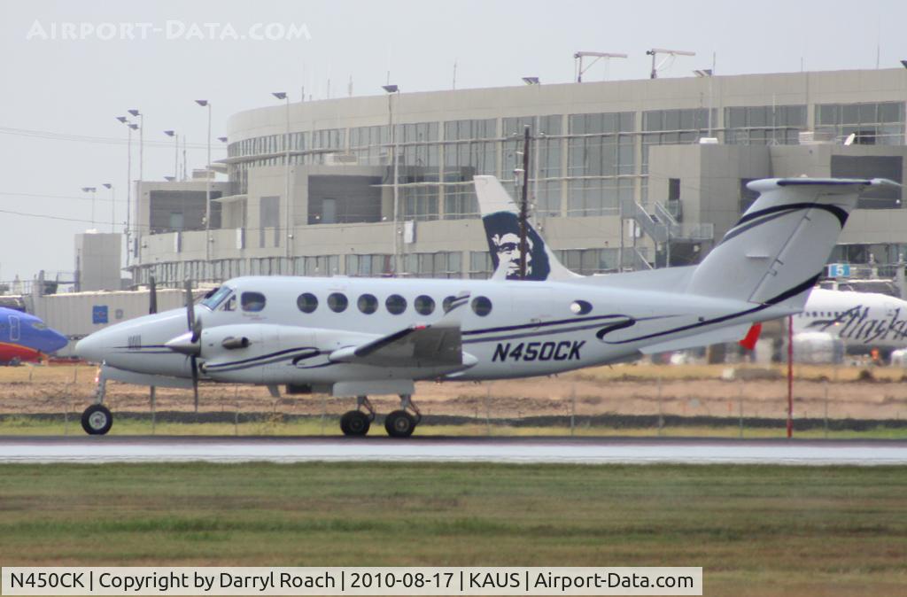 N450CK, Raytheon Aircraft Company B300 C/N FL-464, Raytheon/Beech departs 17L.