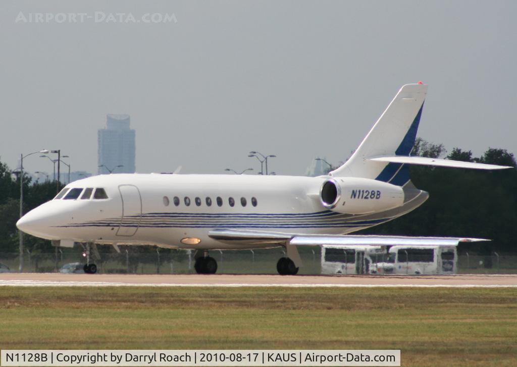 N1128B, 1999 Dassault Falcon 2000 C/N 83, Falcon departs 17L.