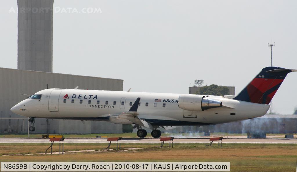 N8659B, 2002 Bombardier CRJ-200 (CL-600-2B19) C/N 7659, DAL CRJ smokes 'em on 17L.