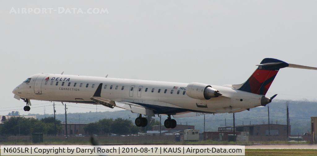 N605LR, 2008 Bombardier CRJ-900ER (CL-600-2D24) C/N 15160, DAL CRJ touches down 17L.
