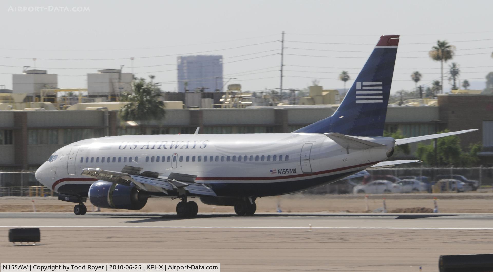 N155AW, 1987 Boeing 737-3G7 C/N 23777, Landing at PHX