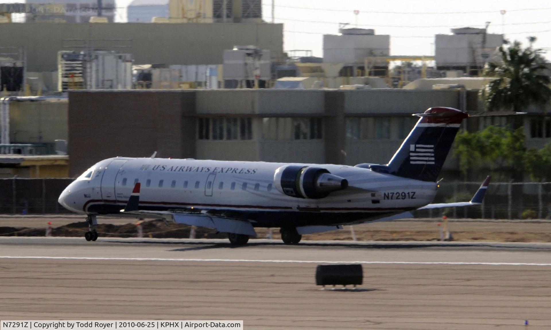 N7291Z, 1999 Bombardier CRJ-200LR (CL-600-2B19) C/N 7291, Landing at PHX