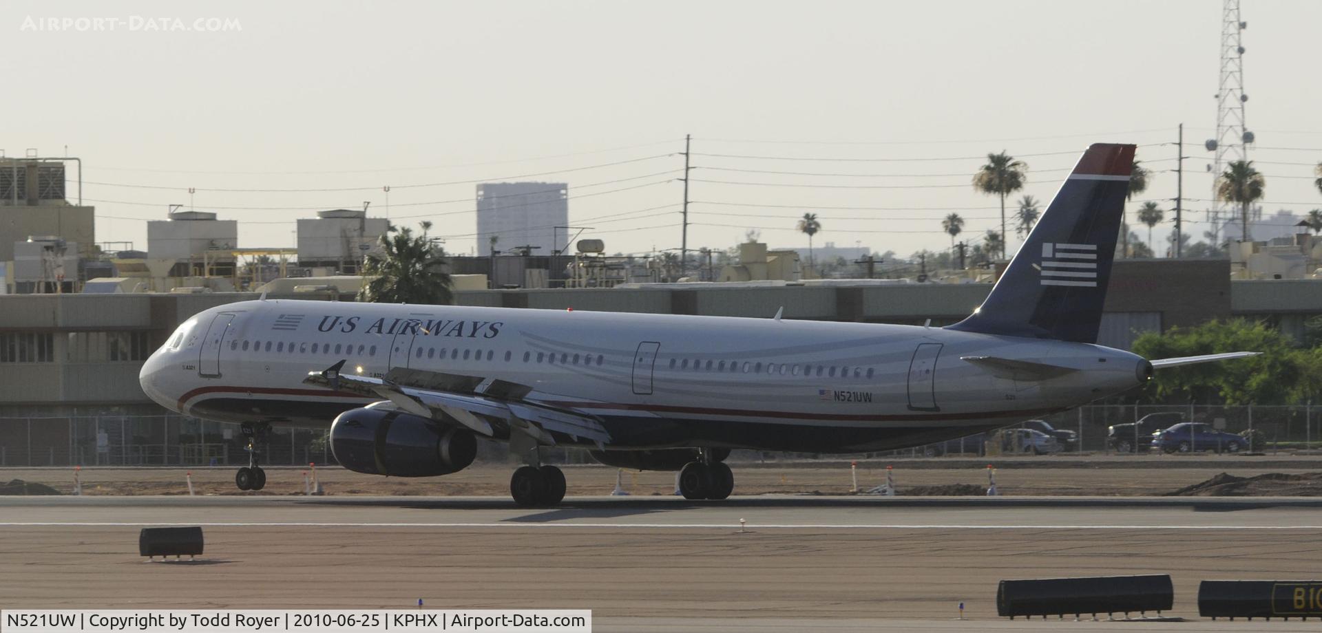 N521UW, 2009 Airbus A321-231 C/N 3944, landing at PHX