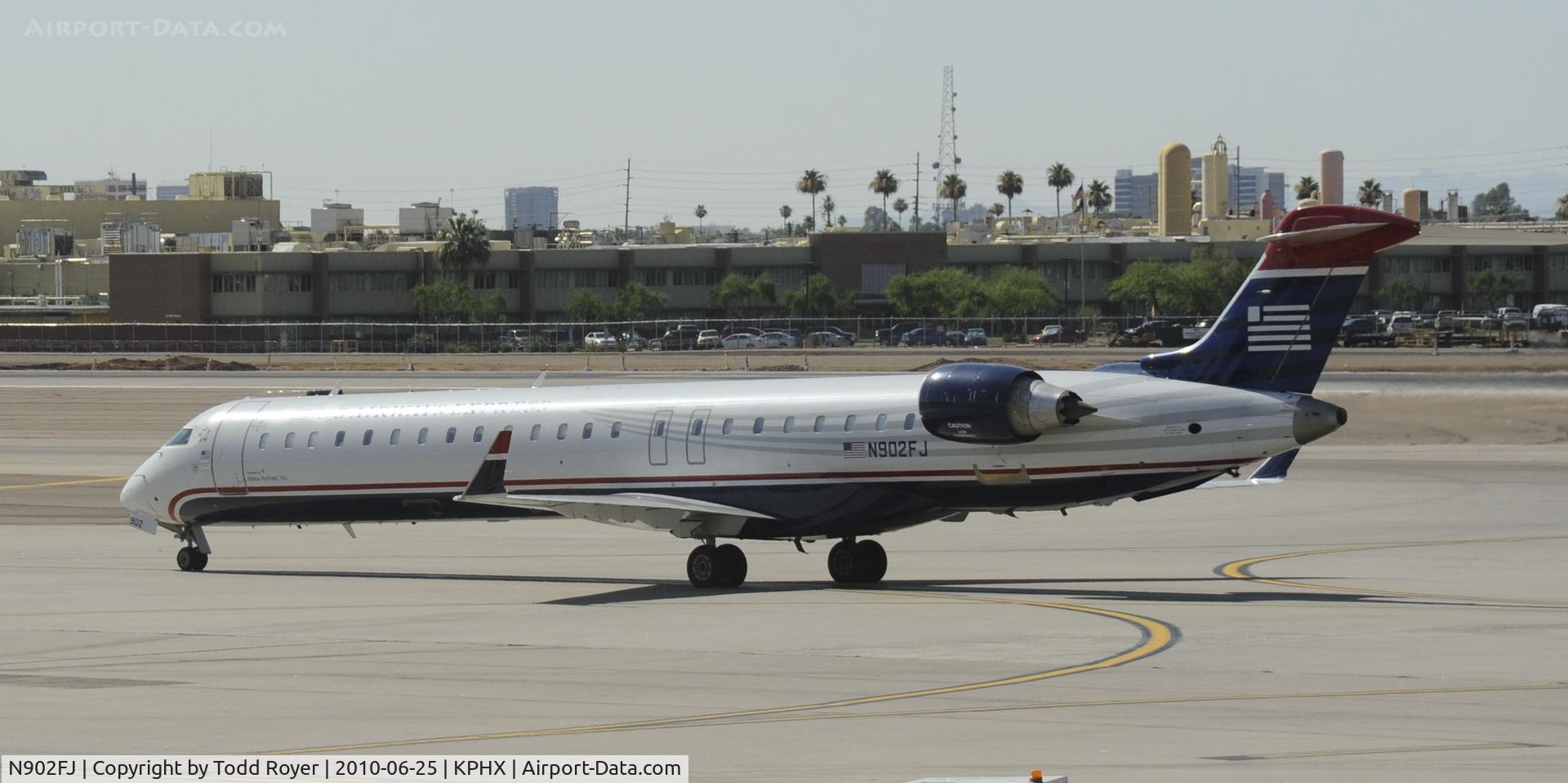 N902FJ, 2003 Bombardier CRJ-900ER (CL-600-2D24) C/N 15002, Taxiing at PHX