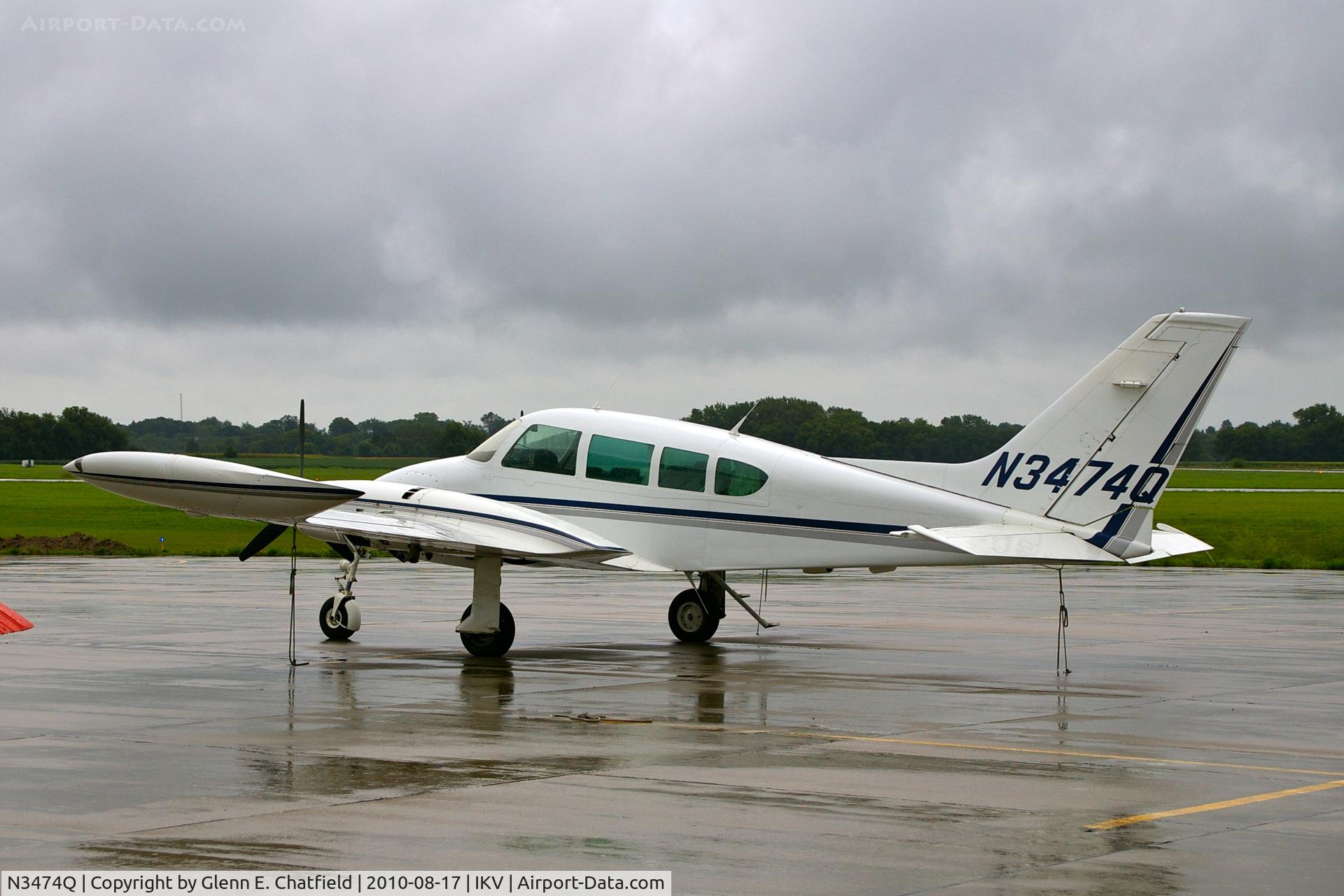 N3474Q, 1966 Cessna 320E Executive Skyknight C/N 320E-0074, On a rainy ramp
