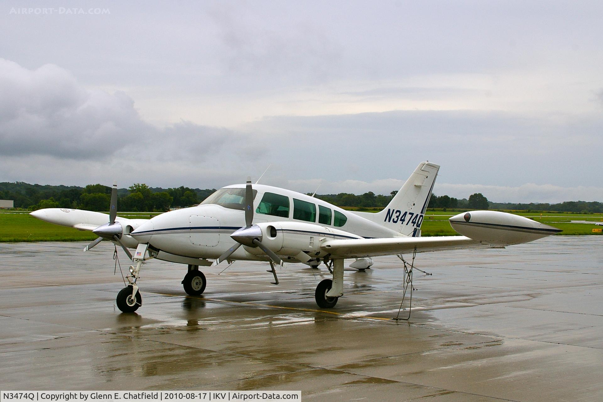 N3474Q, 1966 Cessna 320E Executive Skyknight C/N 320E-0074, On a rainy ramp