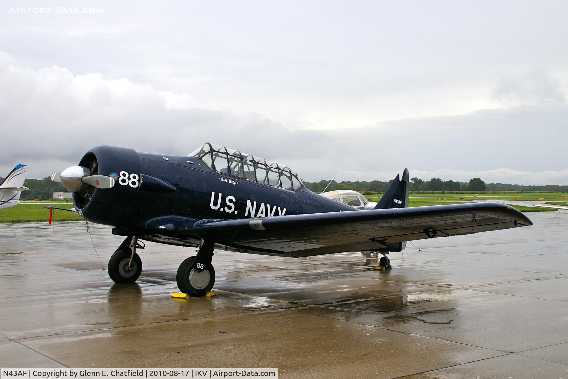 N43AF, 1943 North American SNJ-5 Texan C/N 43667, On a rainy ramp