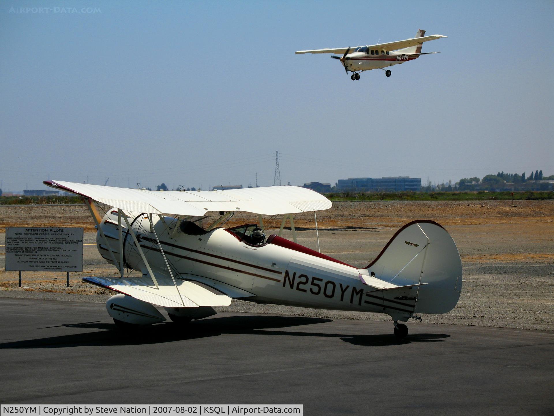 N250YM, 1994 Classic Aircraft Corp WACO YMF C/N F5C-059, 1994 Classic Aircraft Corp WACO YMF holding for take-off at San Carlos, CA with N67VM arriving from Santa Ynez, CA