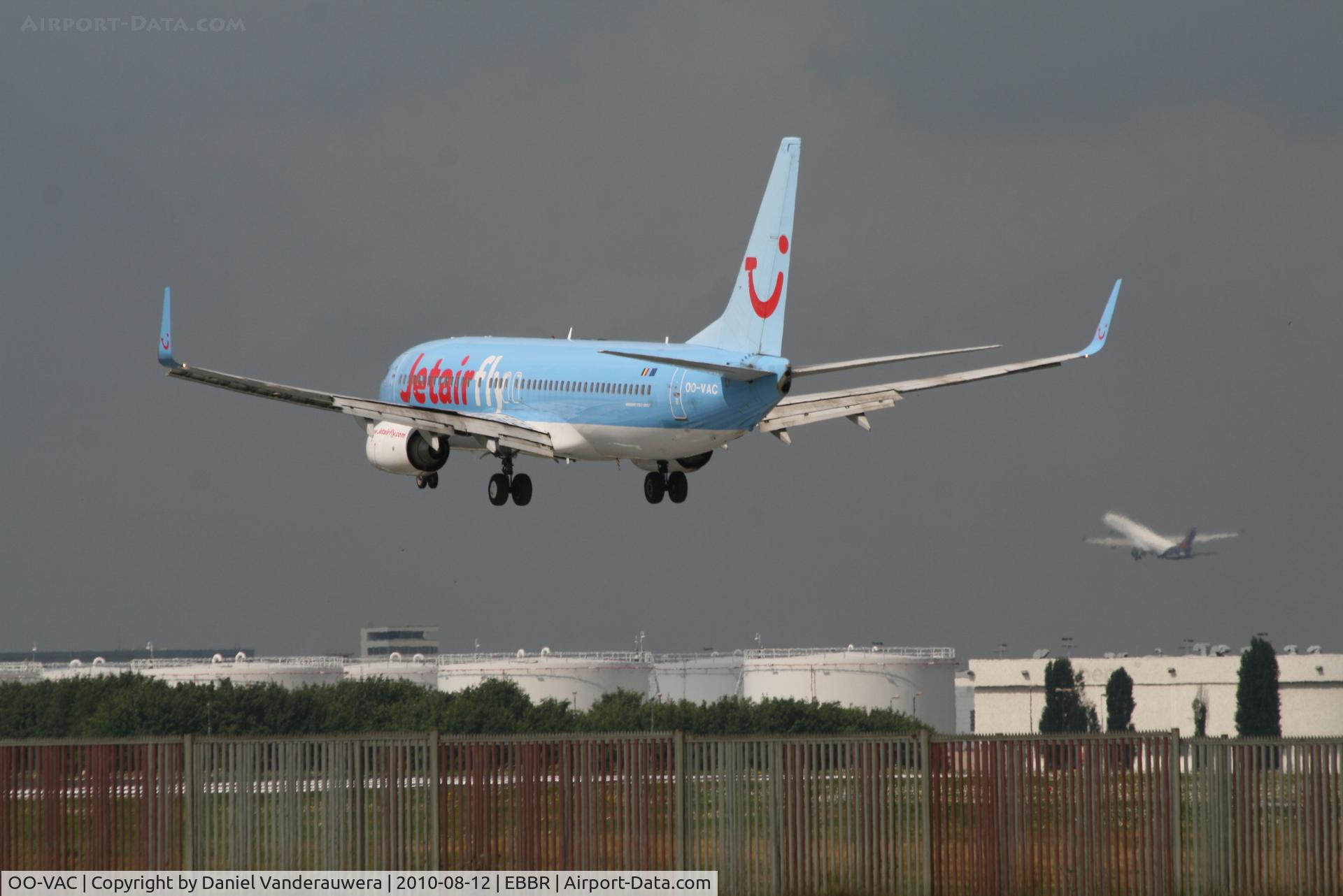OO-VAC, 2003 Boeing 737-8BK C/N 33014, Flight JAF4158 is landing on RWY 25L  while an A330 is taking off from RWY 25R