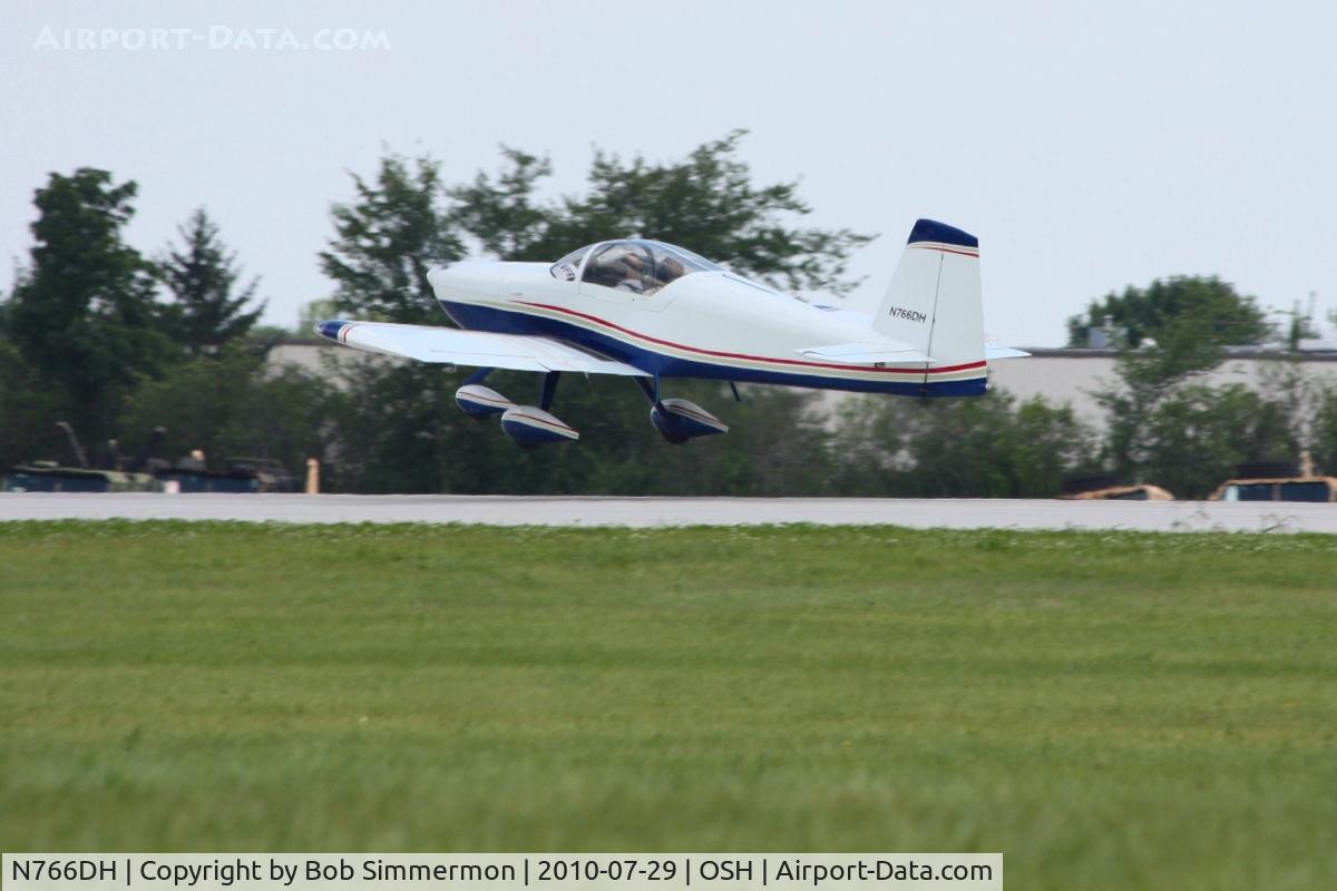N766DH, 2004 Vans RV-7A C/N 70066, Departing Airventure 2010 - Oshkosh, Wisconsin