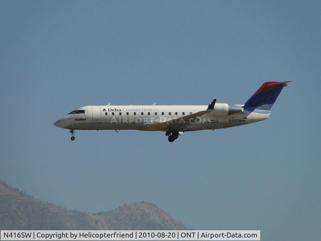 N416SW, 1995 Canadair CRJ-200 (CL-600-2B19) C/N 7089, Sky West making the Delta Connection final to runway 26R