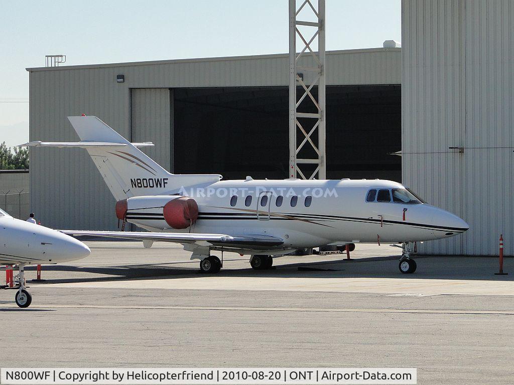 N800WF, 2005 Raytheon Hawker 800XP C/N 258728, Parked on the southside, covered and tied down
