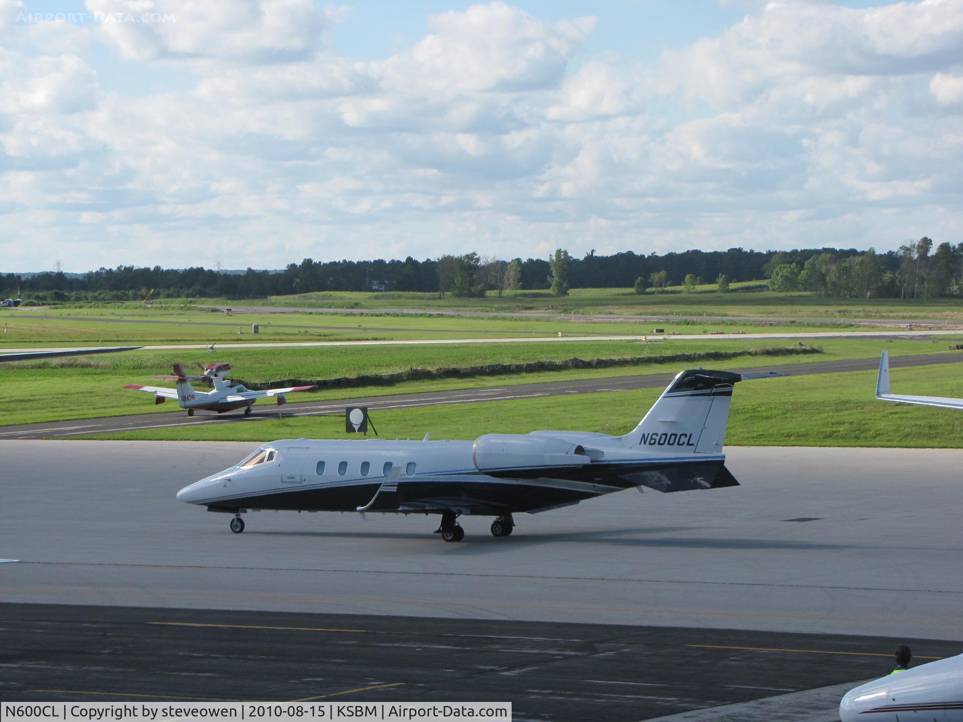 N600CL, 1997 Learjet Inc 60 C/N 110, in the shade at KSBM