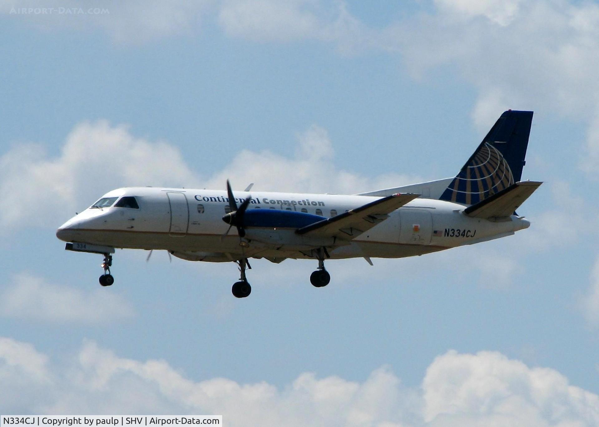 N334CJ, Saab 340B C/N 340B-334, Landing at Shreveport Regional. Same shot, different day.