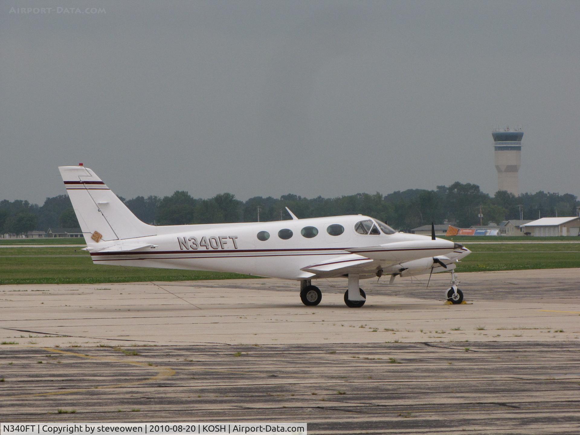 N340FT, 1981 Cessna 340A C/N 340A1245, @KOSH just prior to a thunderstorm