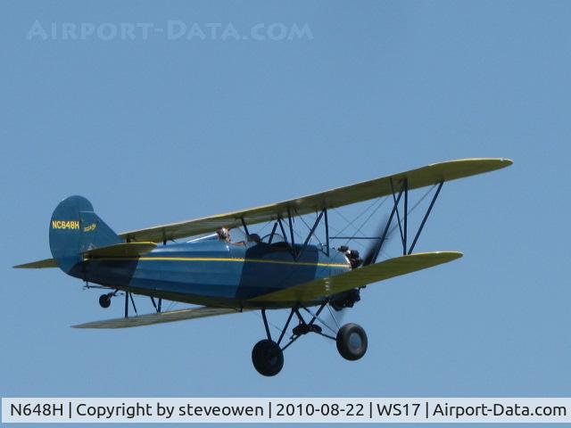 N648H, 1929 Curtiss-Wright Travel Air E-4000 C/N 1224, flying above the Pioneer Airport Oshkosh WI USA