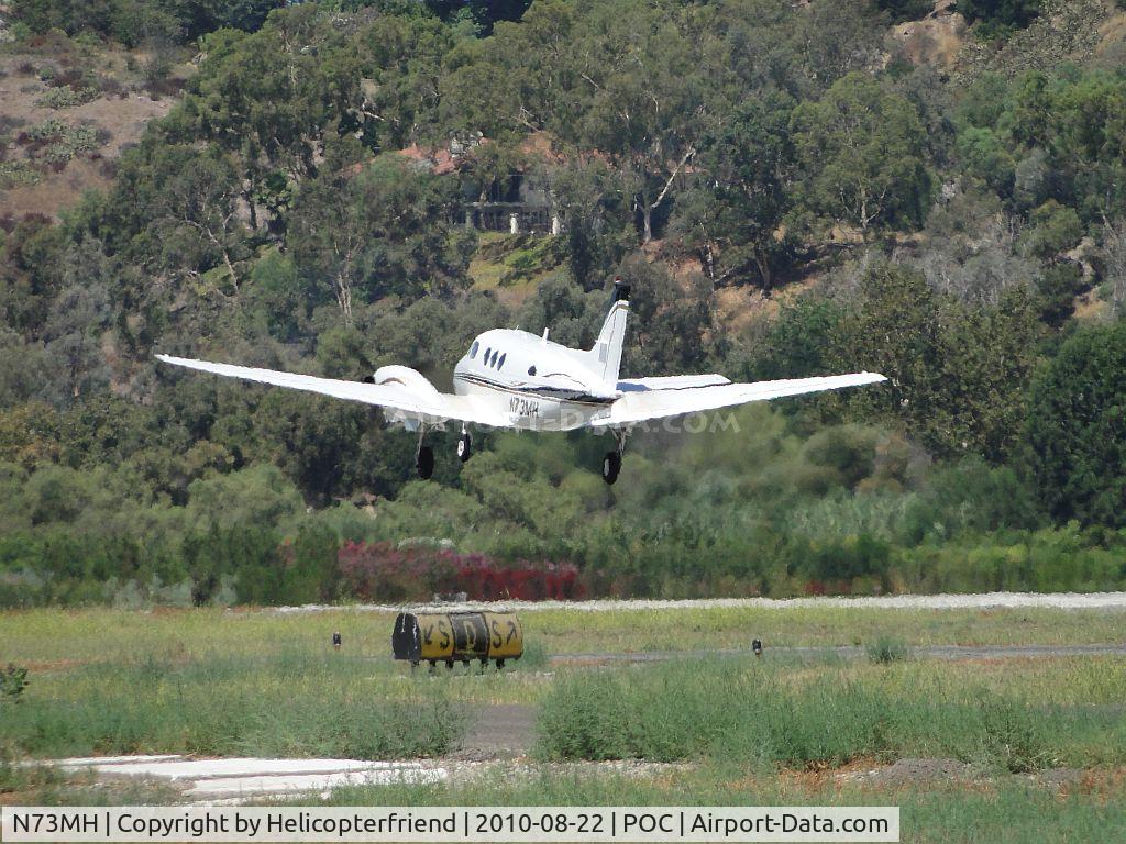 N73MH, 1972 Beech C90 King Air C/N LJ-570, Taking off from runway 26L and heading west