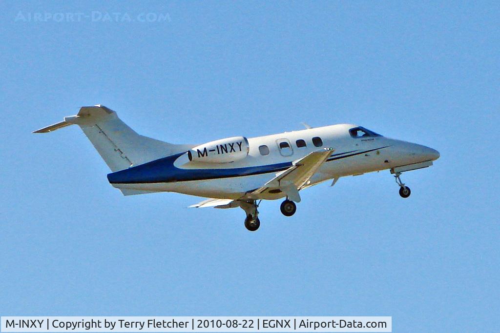 M-INXY, 2009 Embraer EMB-500 Phenom 100 C/N 50000024, Based 2009 Embrear EMB500 Phenom-100, c/n: 50000024 climbs away from East Midlands