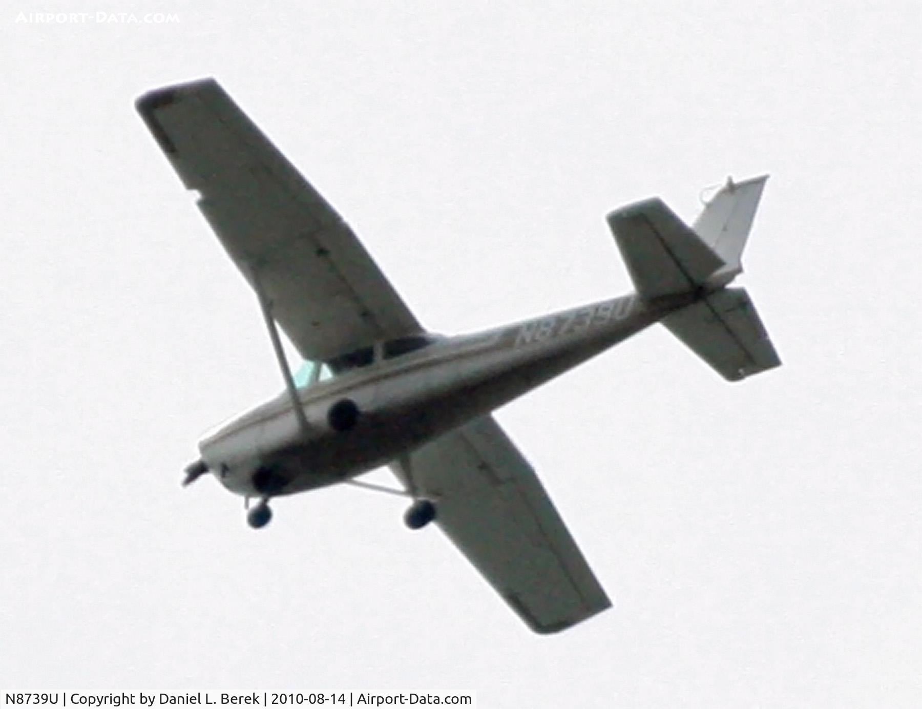 N8739U, 1965 Cessna 172F C/N 17252643, Flying over the beautiful bay of Cape Cod