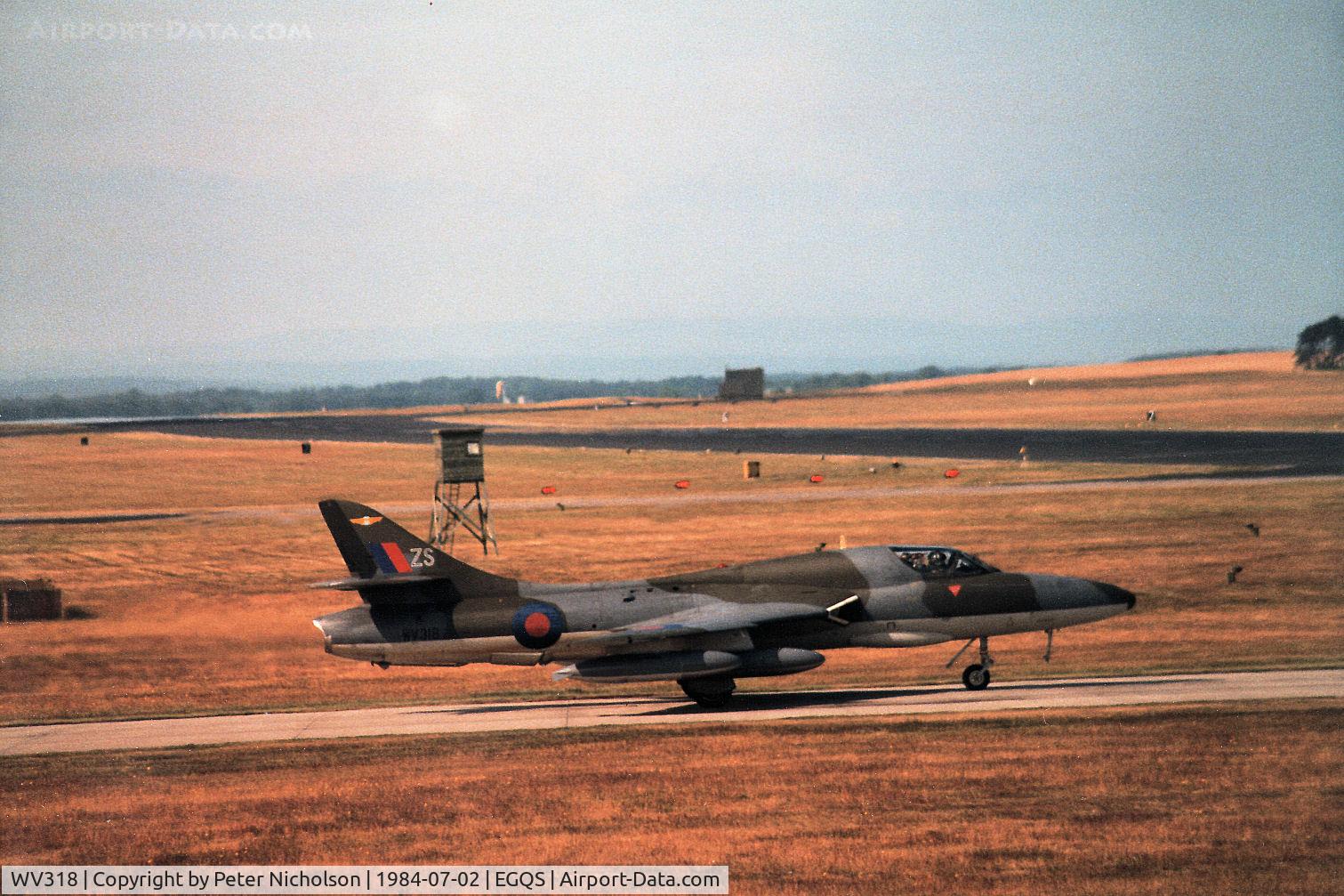 WV318, 1955 Hawker Hunter T.7B C/N 41H-670792, Hunter T.7A of 208 Squadron awaiting clearance to join the active runway at RAF Lossiemouth in the Summer of 1984.