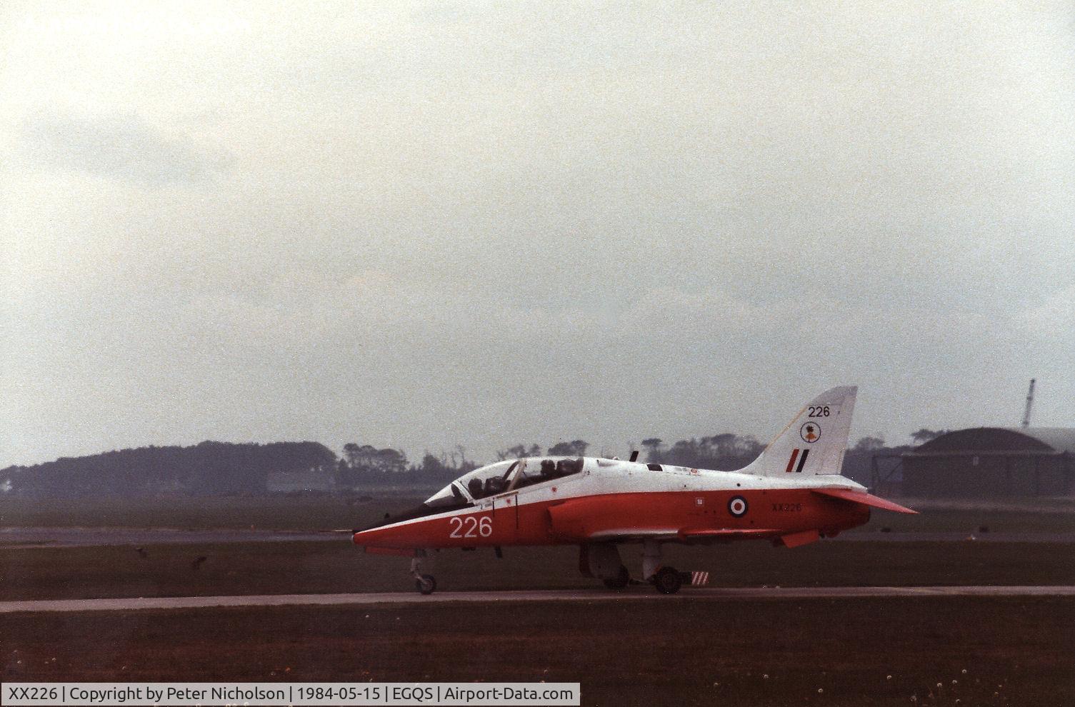 XX226, 1978 Hawker Siddeley Hawk T.1 C/N 062/312062, Hawk T.1 of 4 Flying Training School at RAFR Valley taxying to the dispersal at RAF Lossiemouth in May 1984.