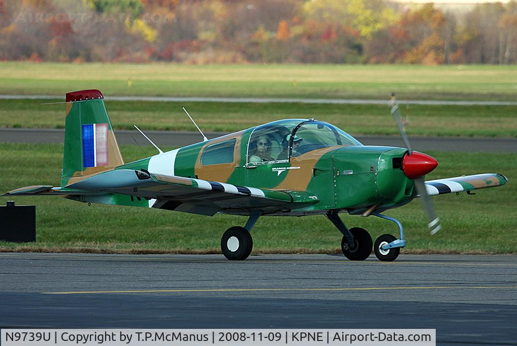 N9739U, 1977 Grumman American AA-1C Lynx C/N AA1C0112, Grumman AA-1C belonging to Hortman Aviation Flight School, taxiing to the gate  at KPNE.