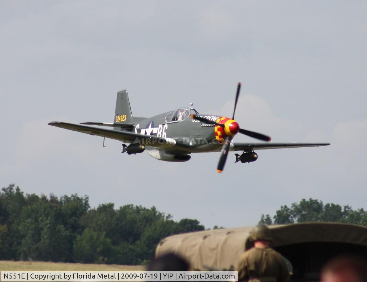 N551E, 1943 North American P-51B-1NA Mustang C/N 102-24700, Roush's P-51B Old Crow flying low over WWII reinactors