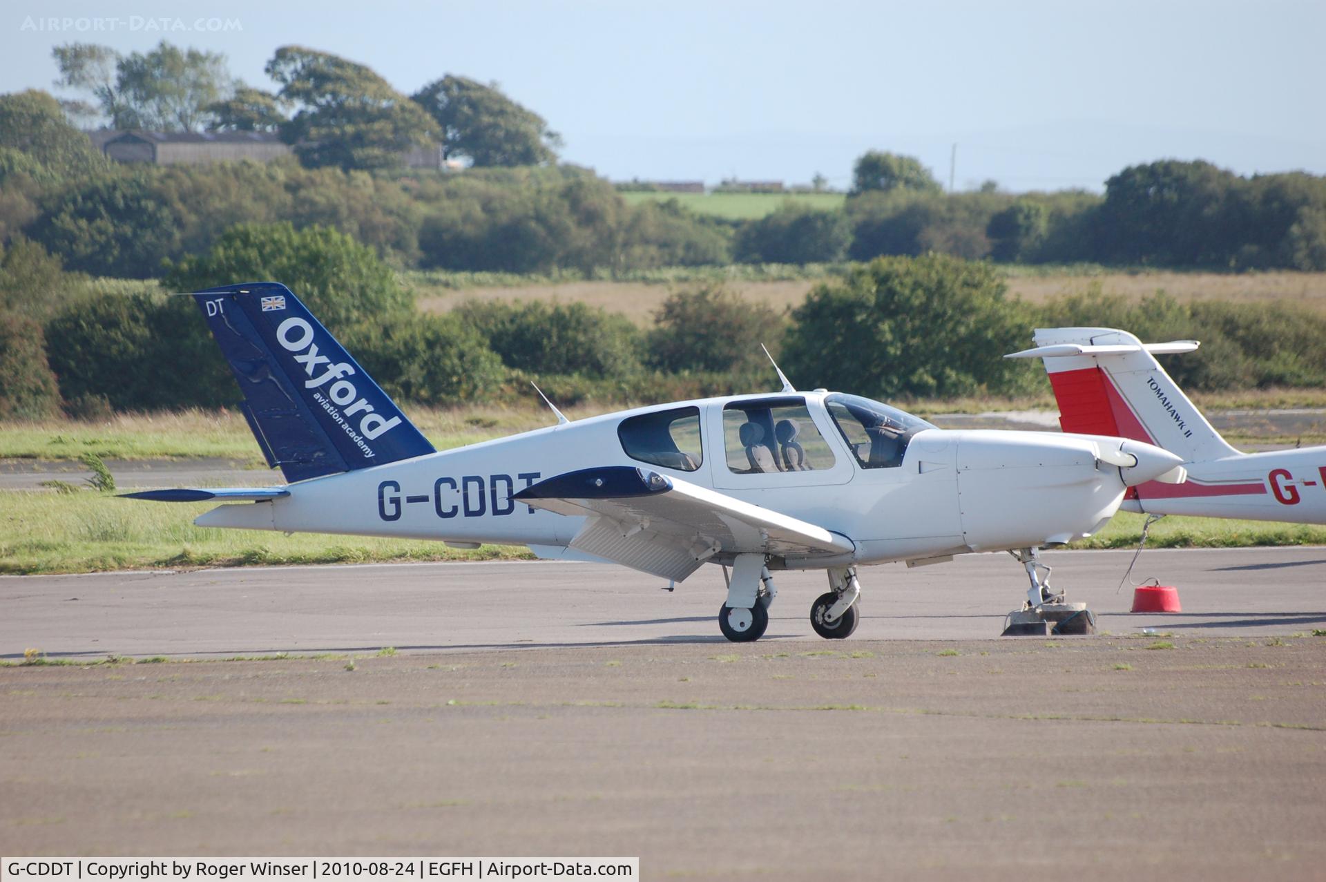 G-CDDT, 1998 Socata TB-20 Trinidad C/N 1858, Coded DT. Socata Trinidad of Oxford Aviation Academy on a training flight from London Oxford Airport.