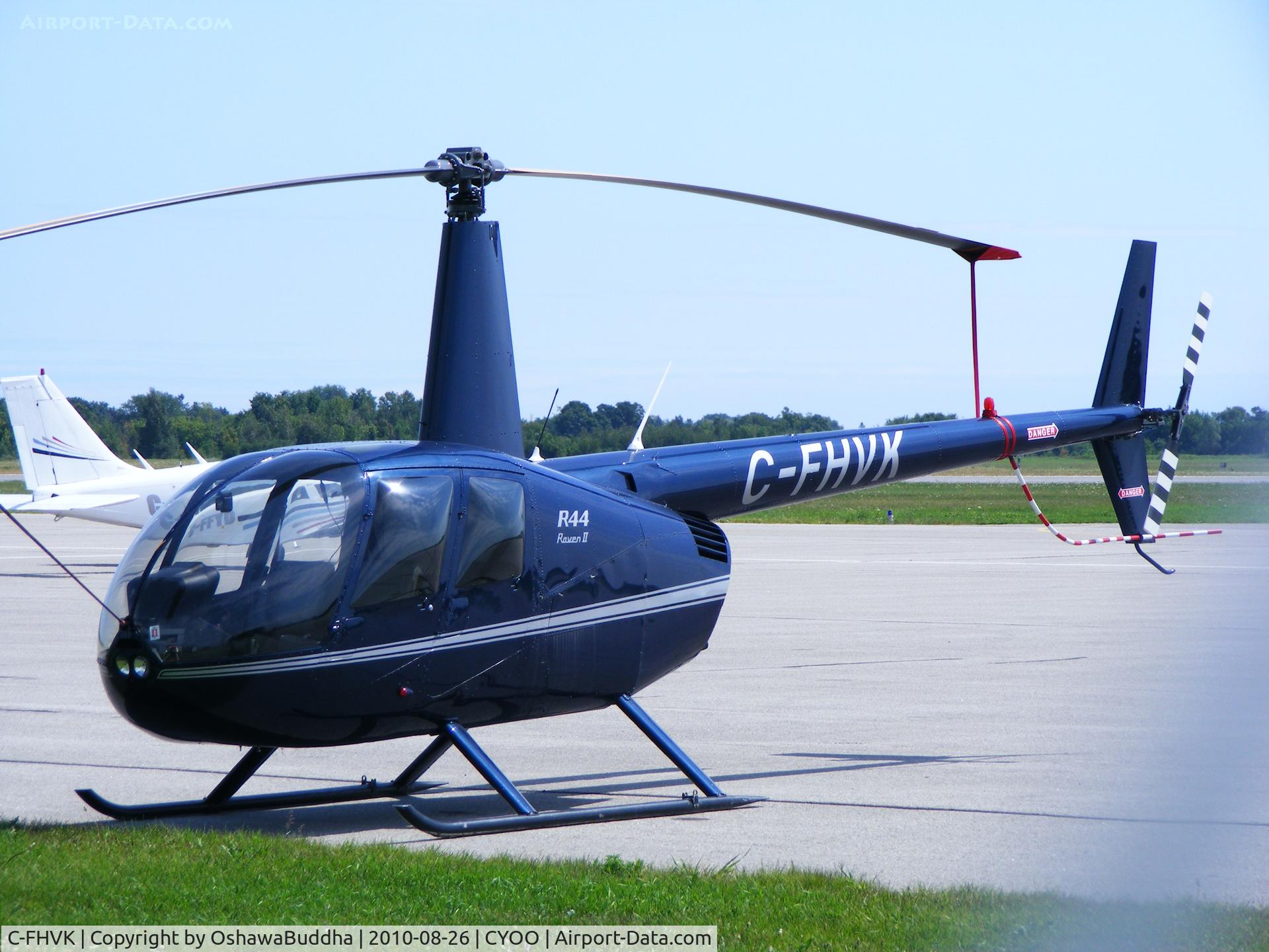 C-FHVK, 2003 Robinson R44 II C/N 10121, Soakin up sunshine, and lookin all spiffy in Oshawa