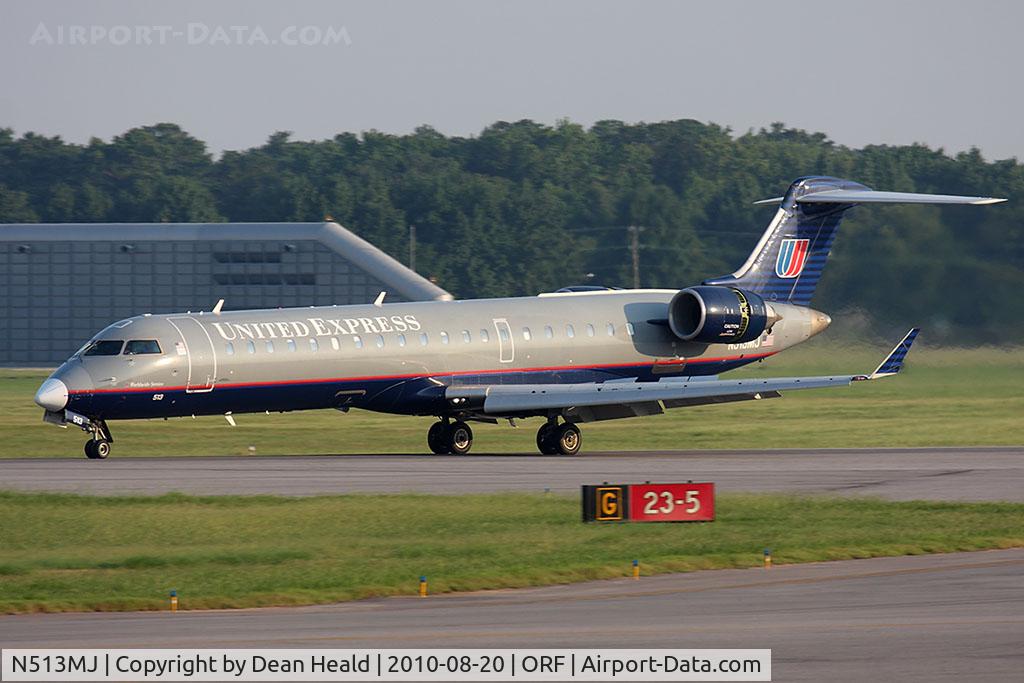 N513MJ, 2003 Bombardier CRJ-701 (CL-600-2C10) Regional Jet C/N 10111, United Express (Mesa Airlines) N513MJ (FLT ASH7290) rolling out on RWY 5 after arrival from Washington Dulles Int'l (KIAD).