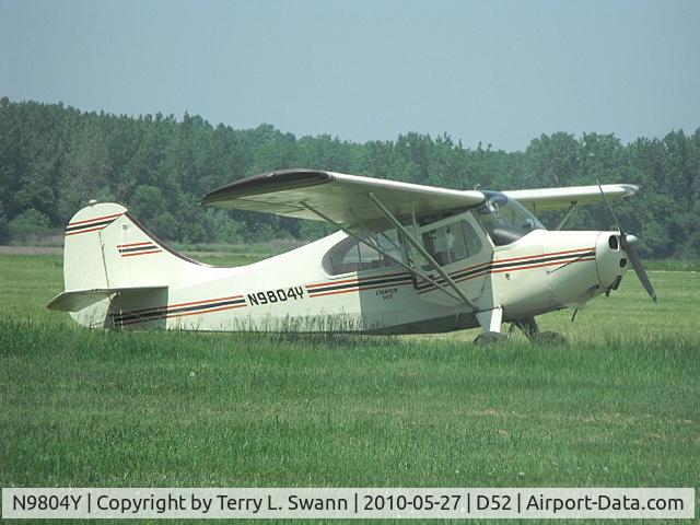 N9804Y, 1960 Champion 7JC C/N 7JC-15, Parked in the grass at Geneseo..