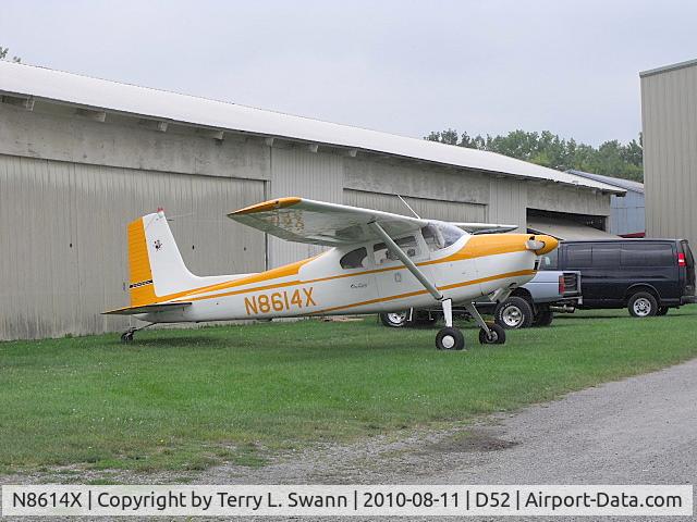 N8614X, 1961 Cessna 180D C/N 18051014, Parked in front of the hanger at Geneseo..