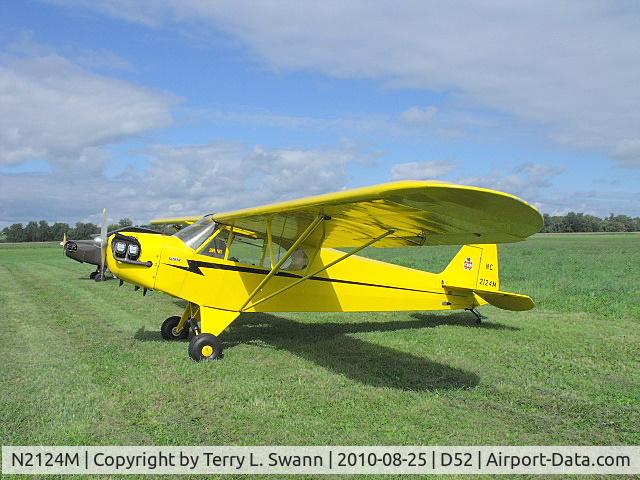 N2124M, 1946 Piper J3C-65 Cub Cub C/N 20908, Parked in the grass with friends, at Geneseo..