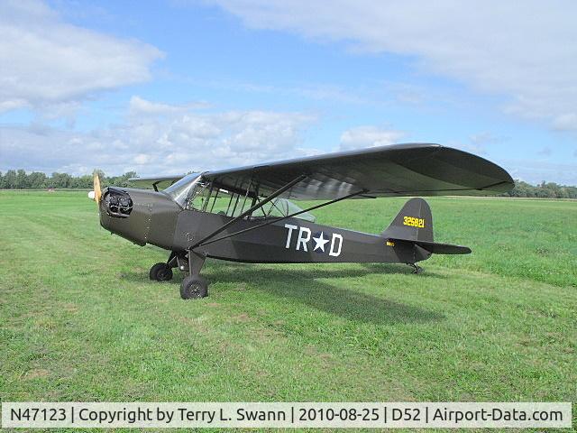 N47123, 1943 Taylorcraft DCO-65 C/N 5133, Parked in the grass with friends, at Geneseo..