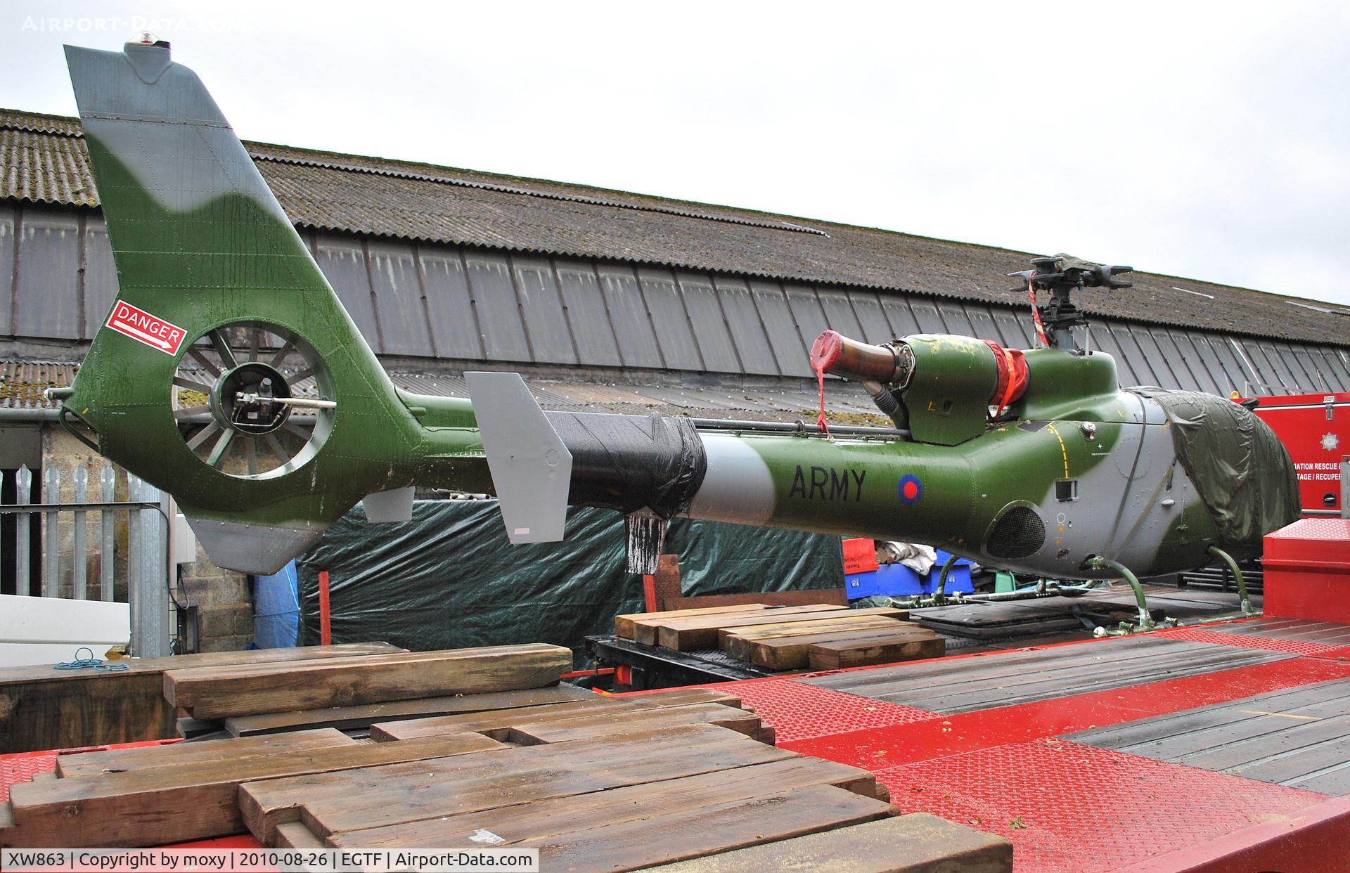 XW863, 1973 Westland SA-341C Gazelle HT2 C/N WA1114, Westland/Aerospatiale SA.341 Gazelle HT.2 Ex Arborfield, Defence College of Aeronautical Engineering. Army instructional airframe serial no: TAD022. On trailer at Fairoaks.