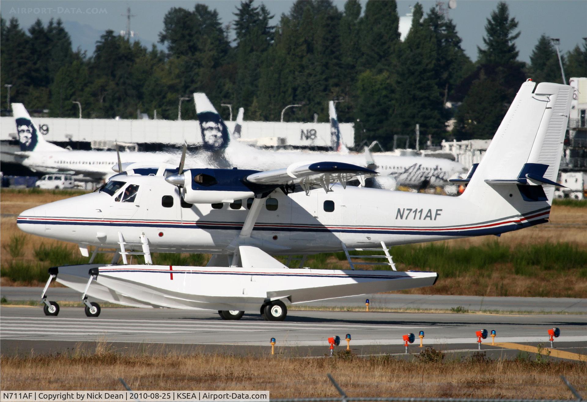 N711AF, 1980 De Havilland Canada DHC-6-300 Twin Otter C/N 711, KSEA Paul Allen Microsoft billionair's twotter departing SEA's 34L this frame is based at KBFI I also have it uploaded under this reg but carrying C-FCSC shot at CYVR back in the 90's