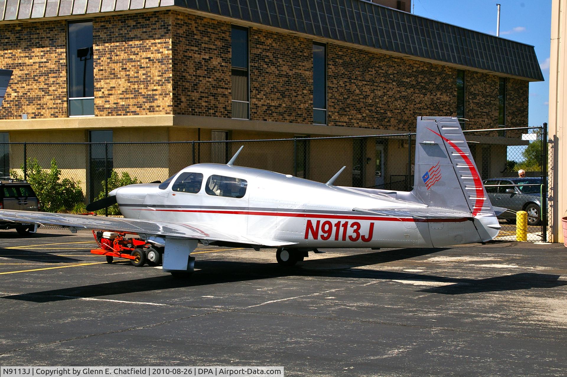 N9113J, 1990 Mooney M20J 201 C/N 24-3181, On the north FBO ramp