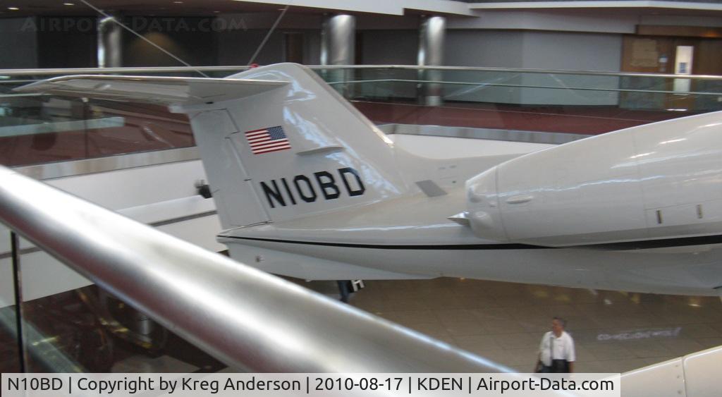 N10BD, 1983 Gates Learjet 35 C/N 506, Sorry for the poor photo, I accidentally deleted the full photo of this plane on my camera. This is Learjet N10BD, the first corporate jet to ever fly into Denver International Airport. Now it's hanging on display in concourse C.
